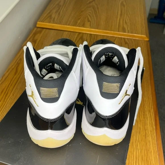 Jordan Black and White Athletic Shoes with Iconic Design display picture 1